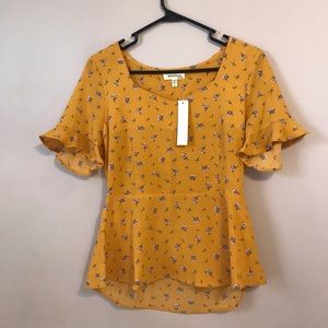 Monteau yellow peplum top